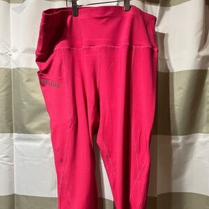 2 pair, NWOT workout capris, Neleus brand, size 2X. Hot pink and wine colors